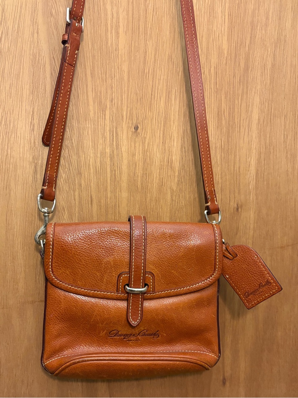 Dooney & Bourke Cognac Leather Crossbody Bag with Buckle Strap